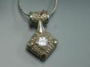  14k white gold  and diamond pendant